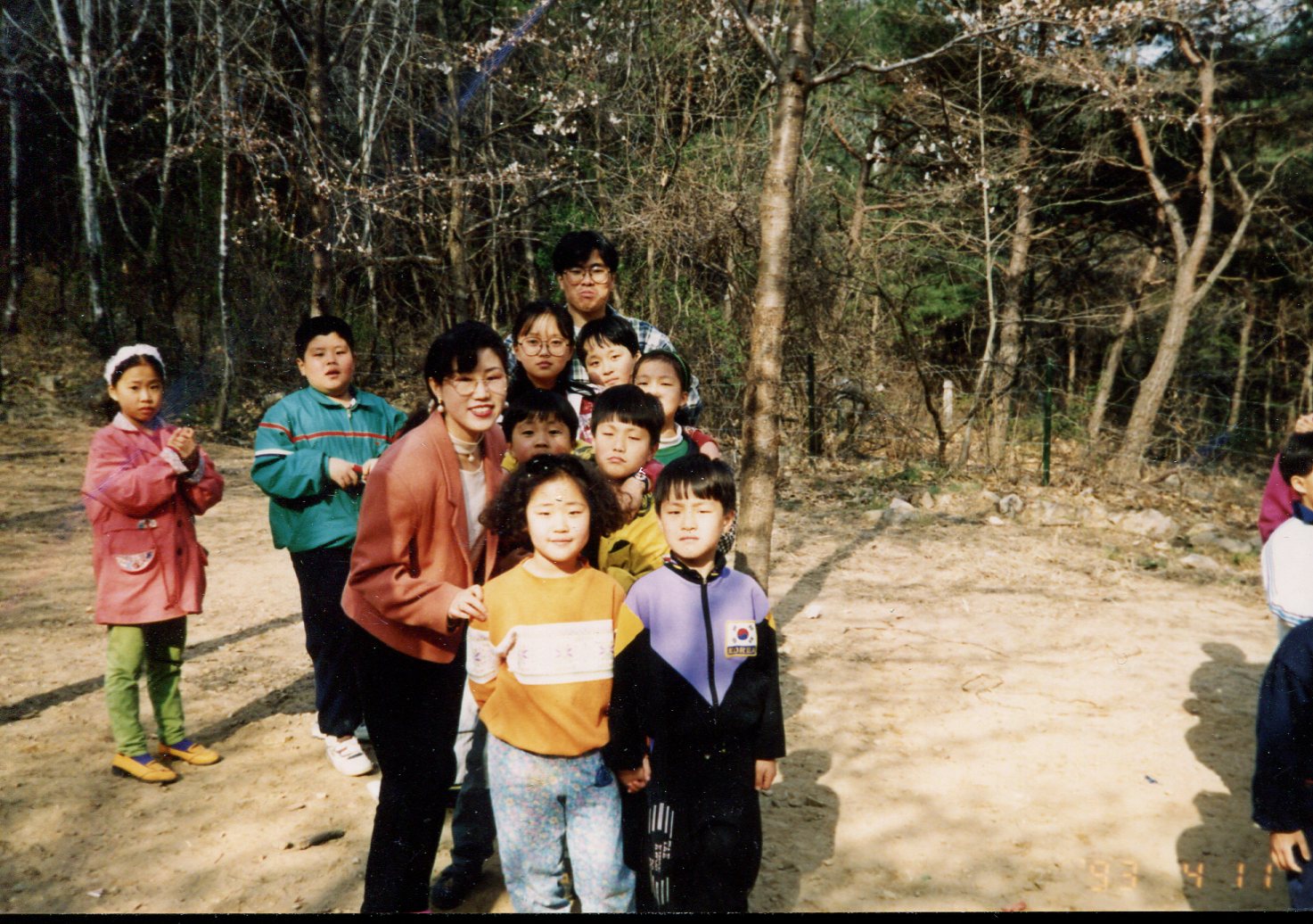 Gina Kim with kindergarten students, 1993