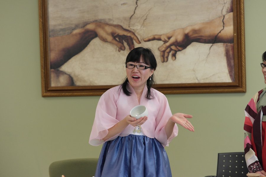 Gina Kim in hanbok presenting the Korean tea ceremony